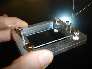 Microfluidic extraction: Small streams of liquid containing precious metals can be processed faster and greener in compact “microfluidic chips”, Credit: Craig Priest